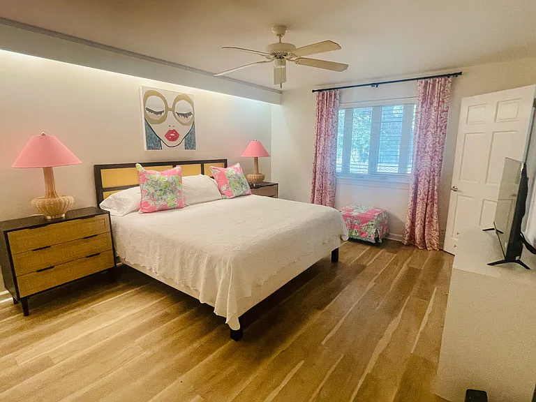 Primary bedroom with king sized bed