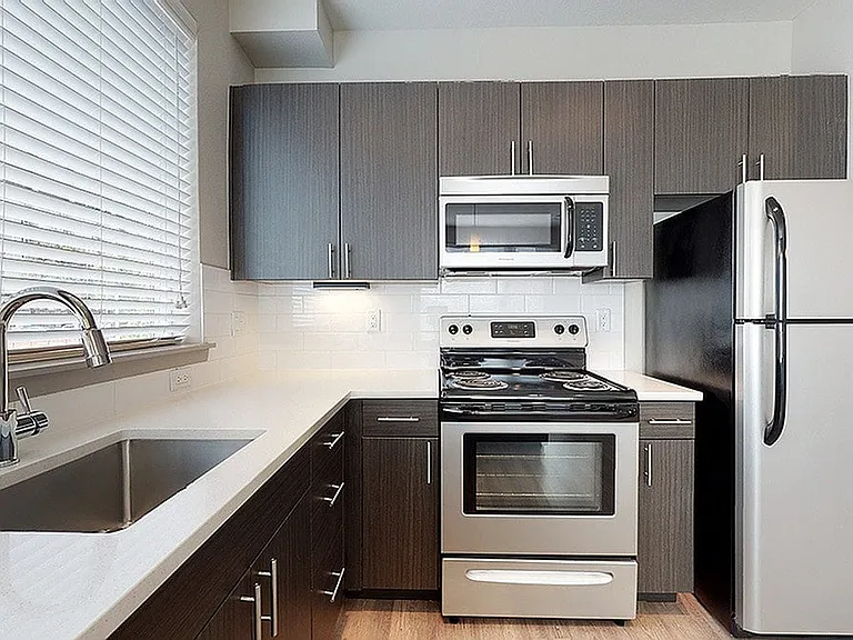 ba_xatsloans_unit1-218_620sf_kitchen2_1200x675
