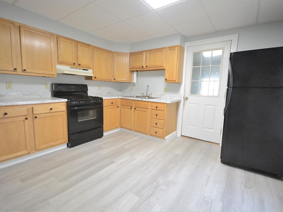 Freshly remodeled kitchen! New countertops and flooring.