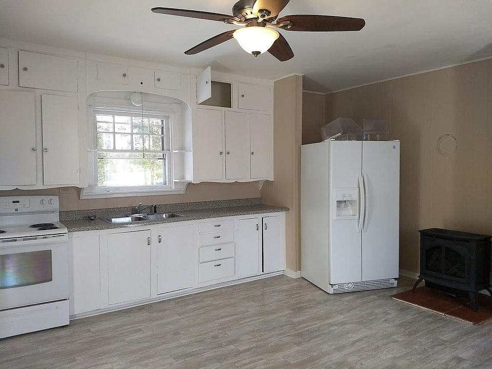 Kitchen with stove and refrigerator included