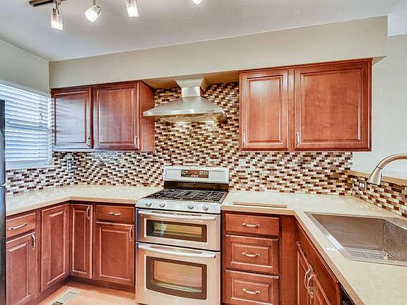 Double gas oven, lots of storage space, deep sink