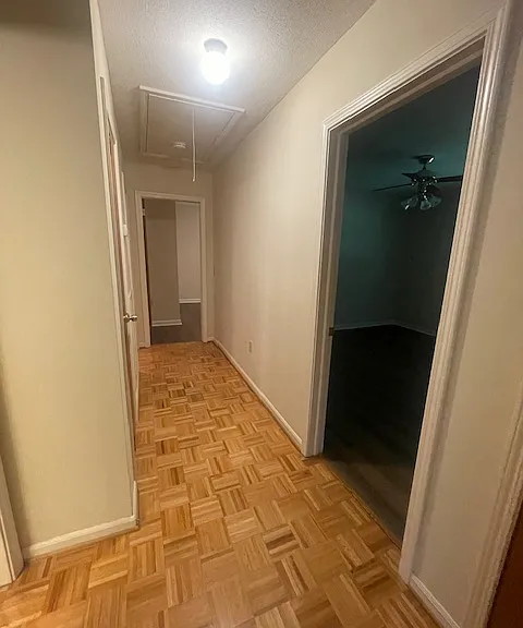 hallway from family room to bedroom/bathroom area