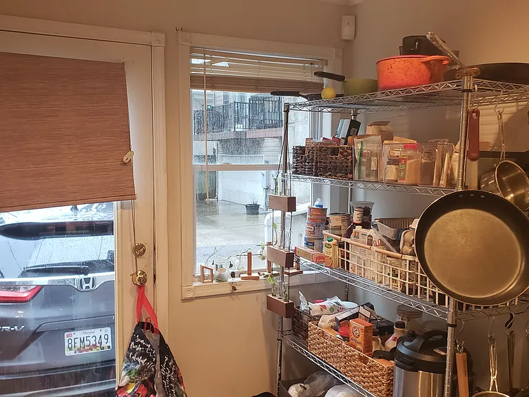 First Floor 'pantry' beyond the galley kitchen looking towards the rear parking