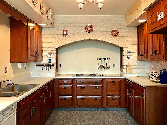 Kitchen with cherry cabinets