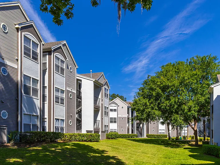 With tree-shaded walkways and well-kept lawns, The Enclave's exteriors reflect the peaceful lifestyle that awaits you inside.