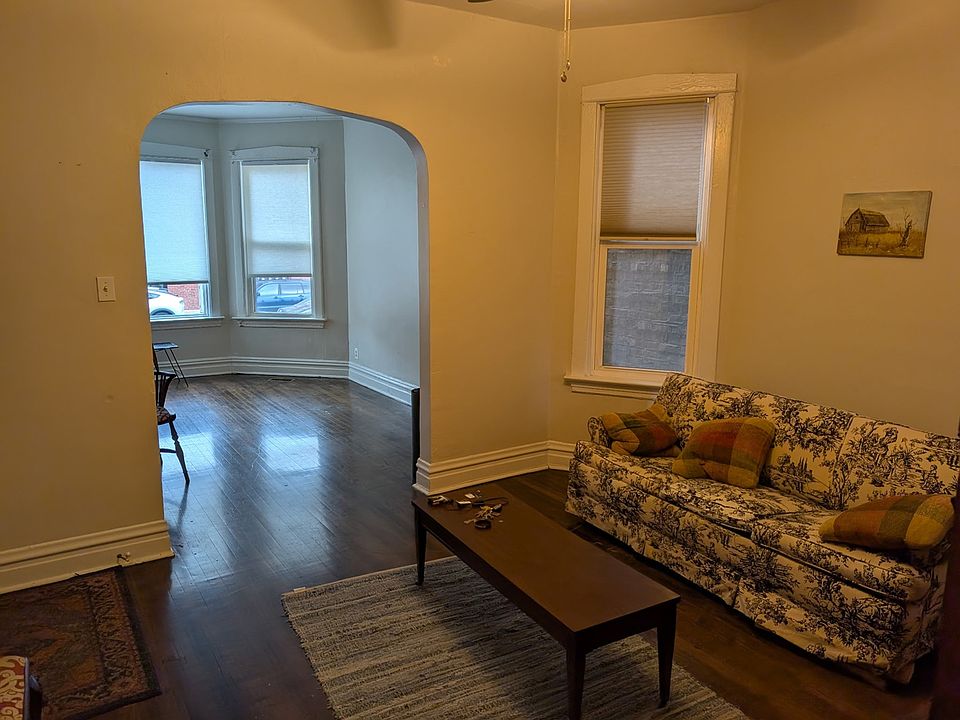 Furnished 'dining room', looking into living room.