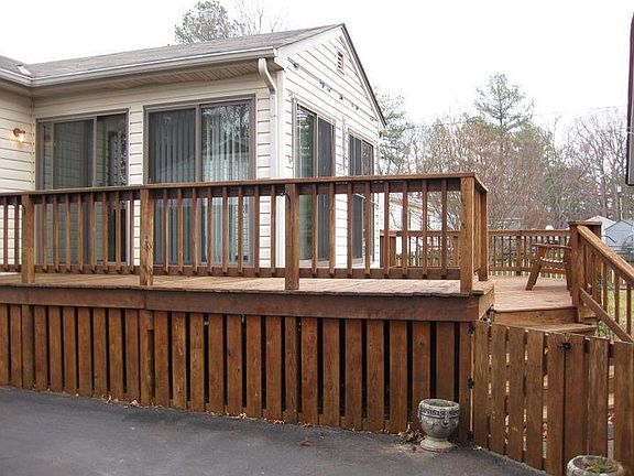 Nice Glass enclosed porch with Wrap around Deck