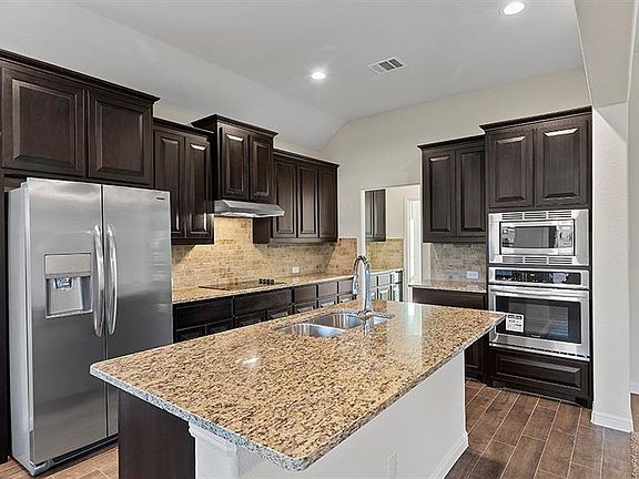 Photos shown here may not depict the specified home & features included are for illustration purposes only