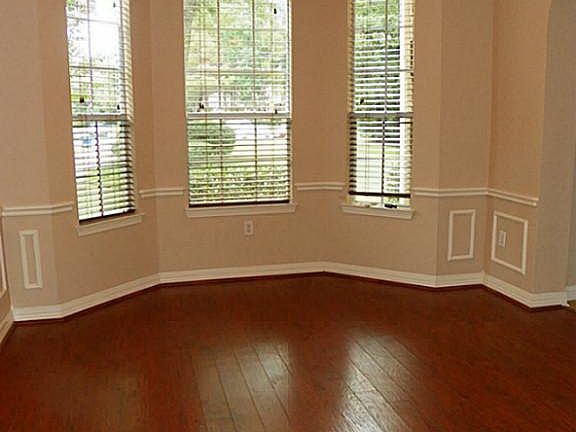 Upon first entering the home, you can turn to the right to see the stately dining room.