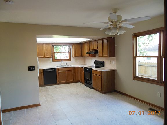 Kitchen view with window over sink