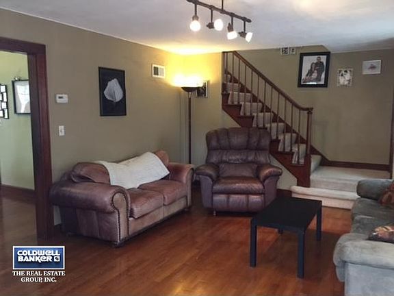 view of open staircase in LR