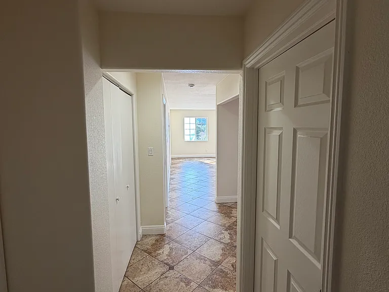 Hallway into the kitchen/living area