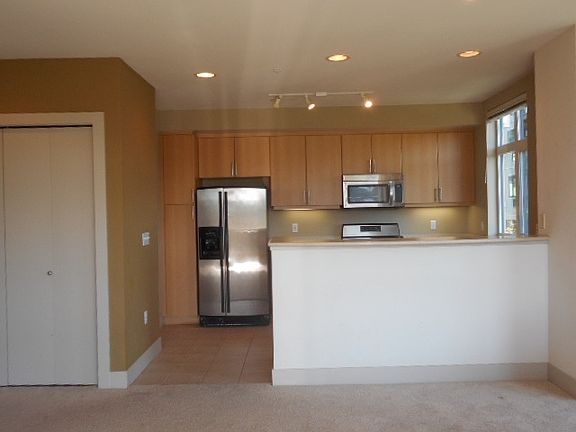 Kitchen with handy eating bar.