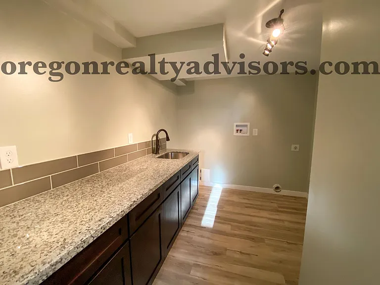 Lower Level Laundry Room with Washer/Dryer Hookups