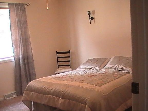 Master bedroom features his and hers closets!