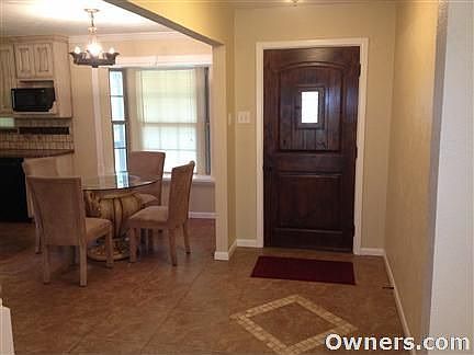 Front entry and small dining