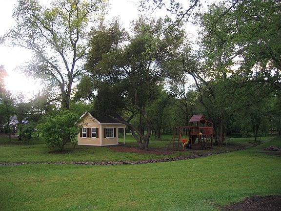 Playhouse and swing set