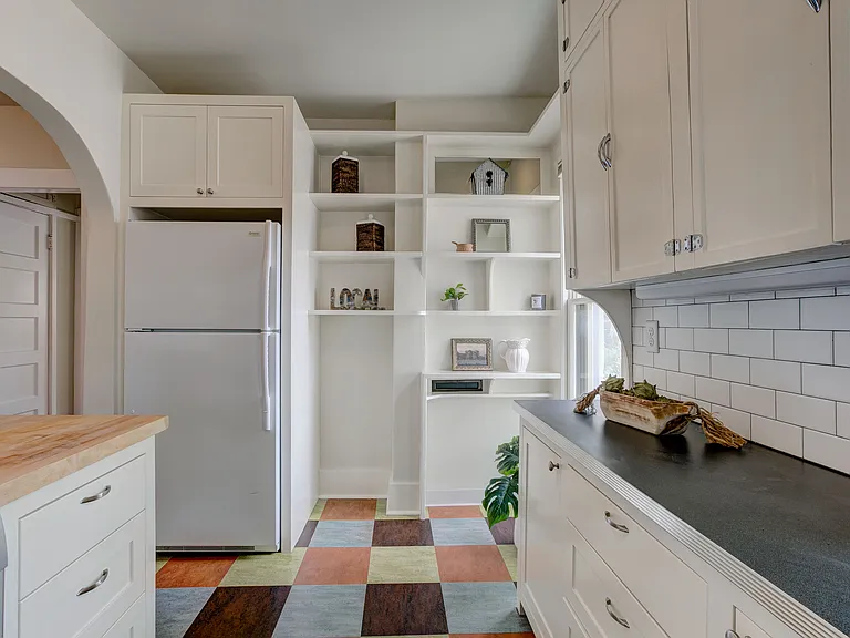 original shelves + custom cabinet above frig