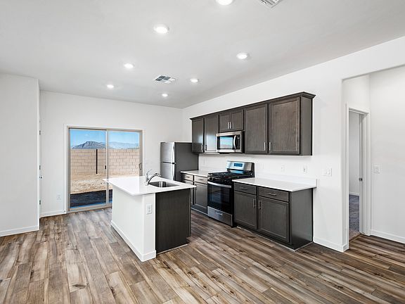 The kitchen has beautiful natural lighting.