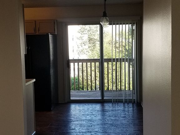 From Living room to dining area - private balcony with sliders - kitchen on the left
