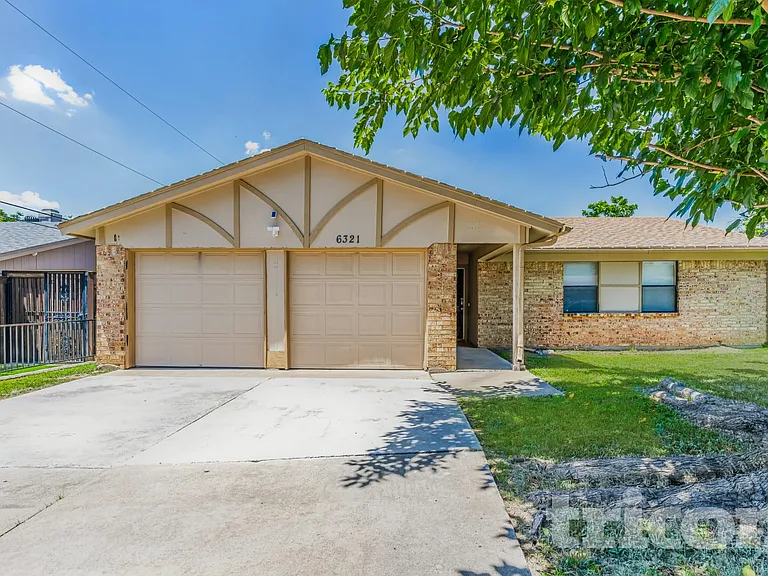 6321 Macarthur Dr — Photo 2