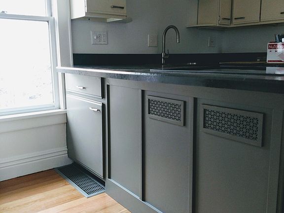 separate kitchen with island and extra storage