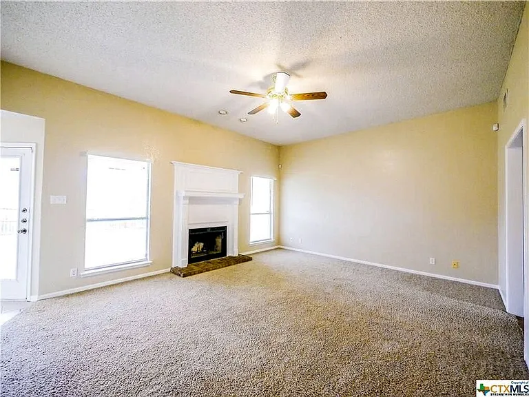 Living room with fireplace.