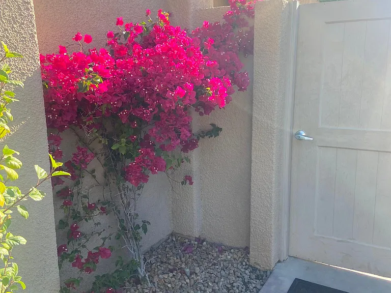 Private front yard gated entry. Locks for privacy and you can enter your courtyard from your private two car garage .