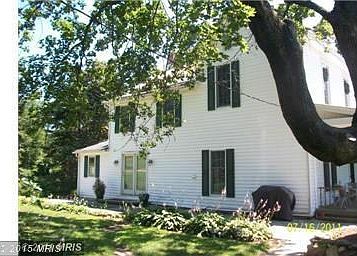 Side foyer entry with newly resurfaced patio