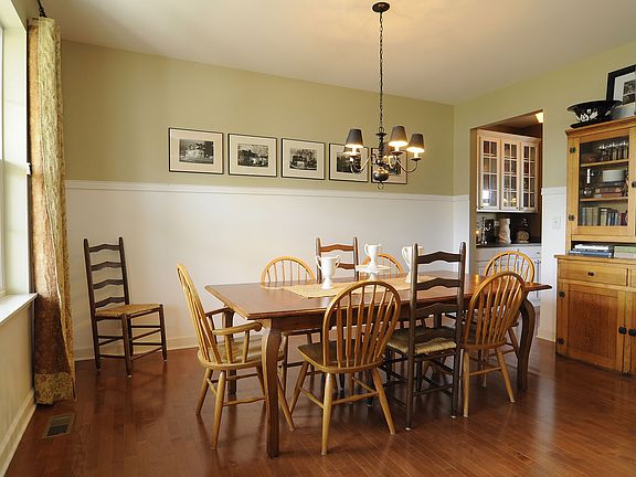 Spacious dining room with custom carpentry~