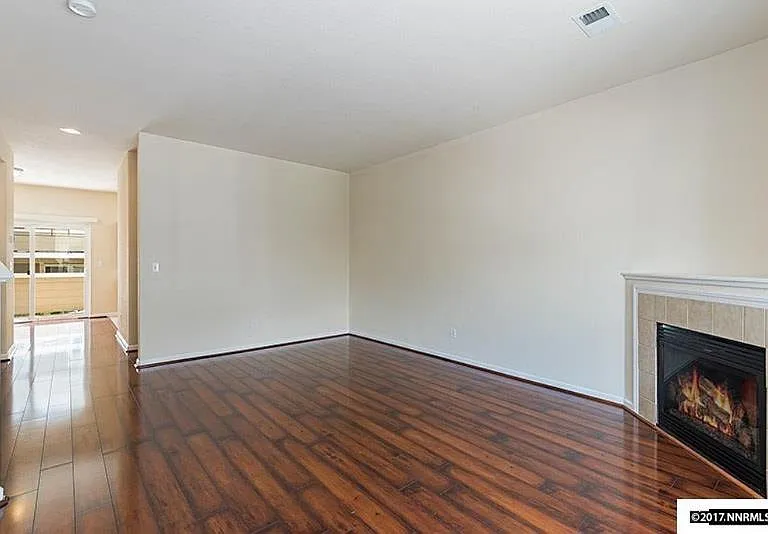 Living Room with a Fireplace on the Second Level