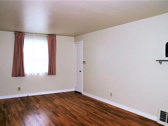 The living room design may efficiently accommodate a variety of layouts and styles of furniture! What ambience would you create?