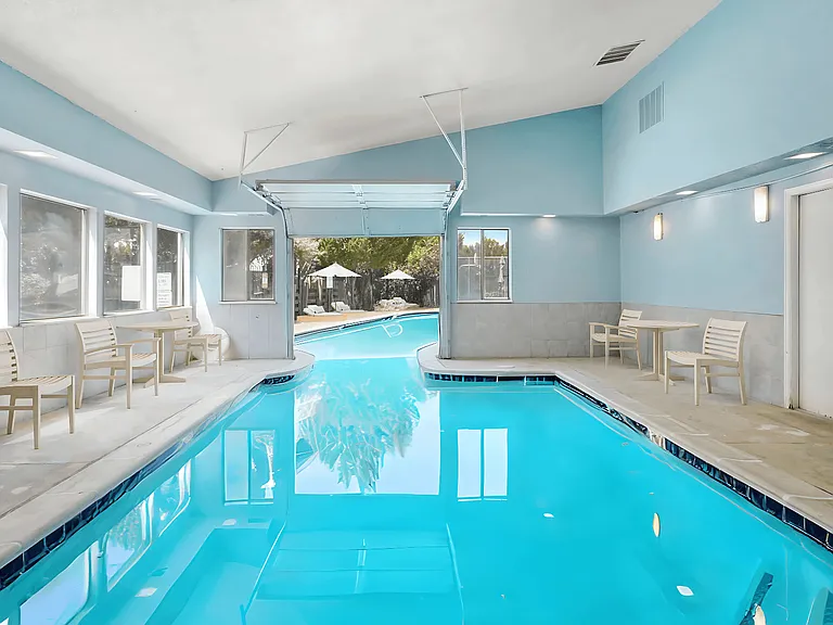 The Indoor/Outdoor Pool at Horizon East Apartments.