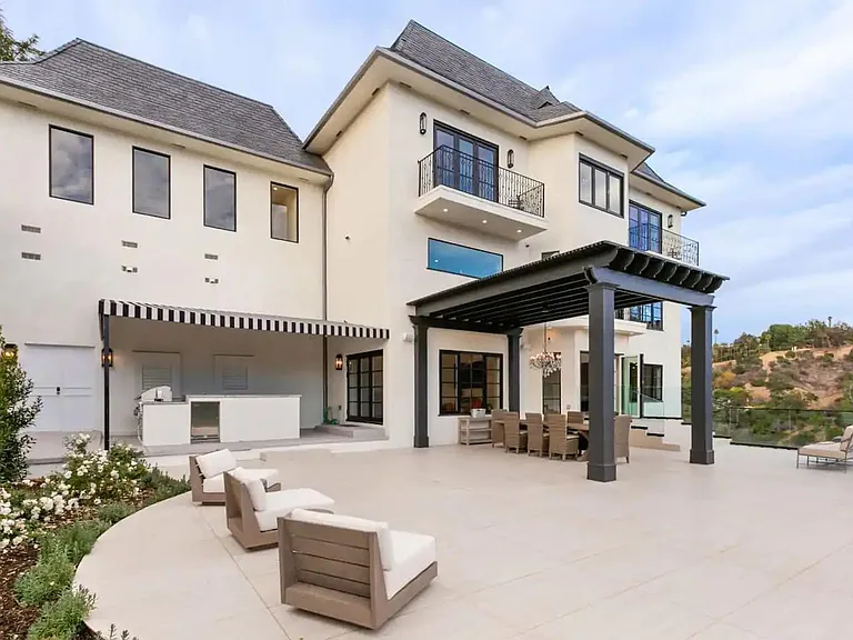 Gorgeous French Chateau accents for this unique home in set the hillside of Beverly Hills.