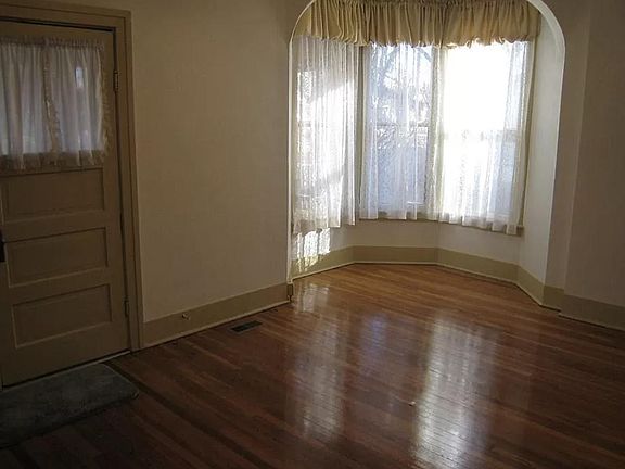 Living room with bay window vacant
