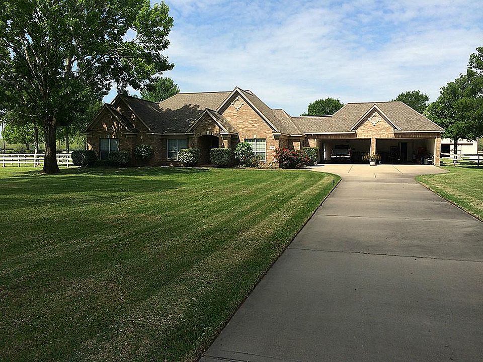 Beautiful Custom Home sits on 2 acres, features 4 bedrooms, 2.5 bathrooms, 4 car garage! Barn! Entry