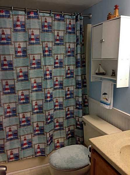 Full bathroom with bathtub