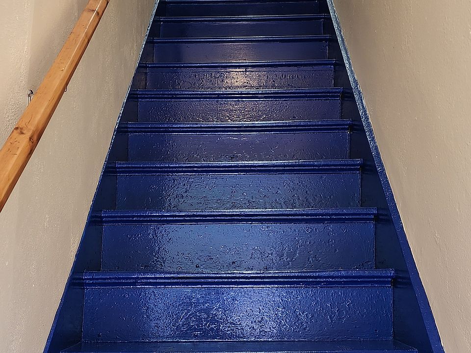 Looking up the Stairs to Apt