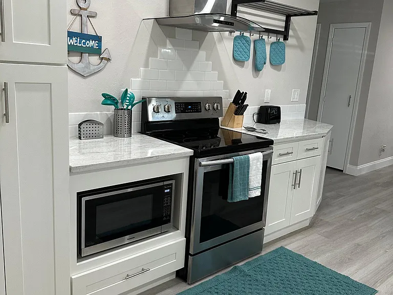 Sleek modern design in this brand new kitchen.