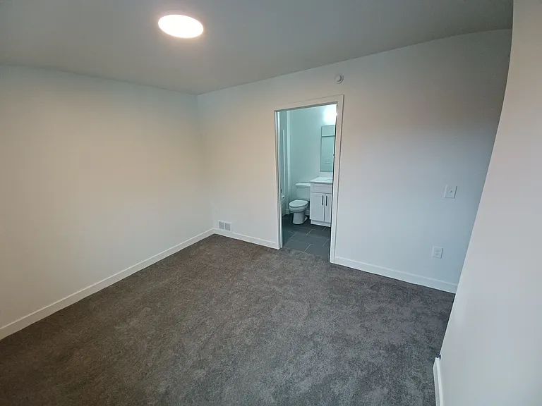 Bedroom in Anthony 2 bedroom unit. Both bedrooms have ensuite bathrooms