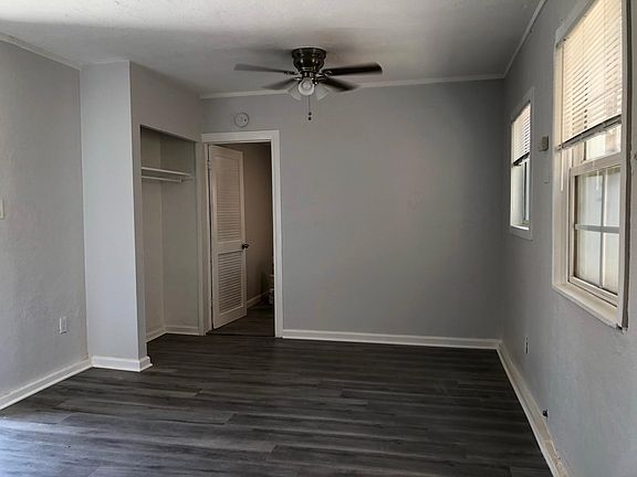 View from kitchen area (open floor plan) towards bedroom.