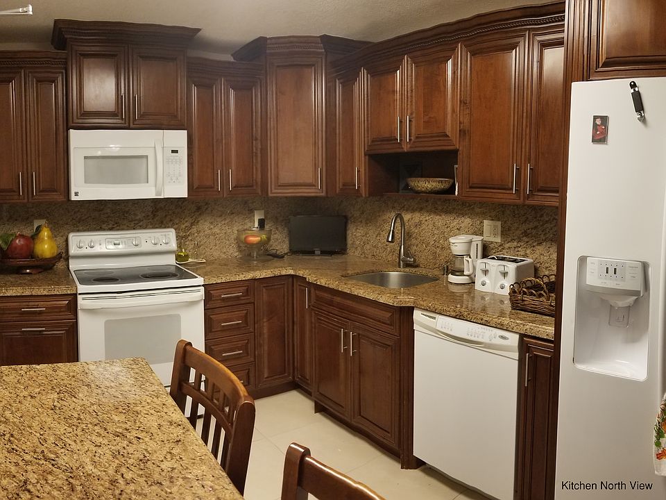 Rich wood, stone countertops