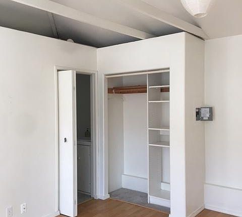 closet and entry to separate bathroom