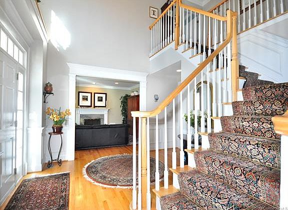 Foyer with center staircase