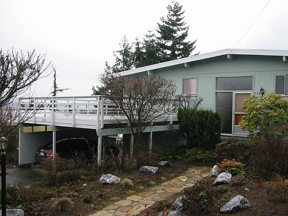 2 car carport w/deck.