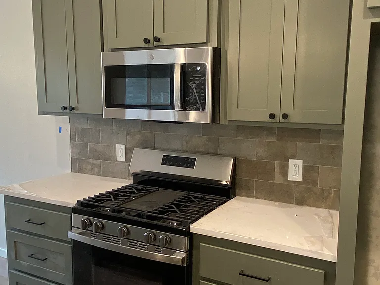 Kitchen with Microwave and Gas Range