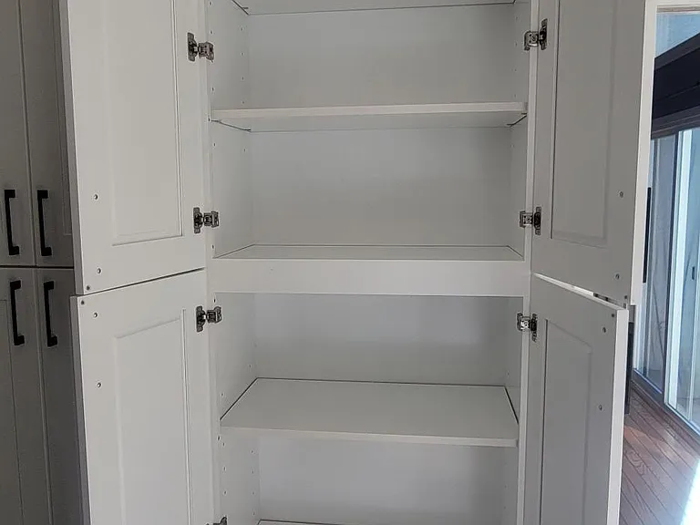 Ample built-in pantry and storage space.