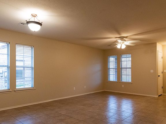 Open concept with lots of natural lighting. Coat closet by main entrance.