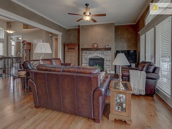 Stone fireplace and extensive upgraded trim throughout.