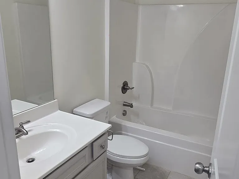 Main Bathroom in the hallway on the second floor directly adjacent the staircase